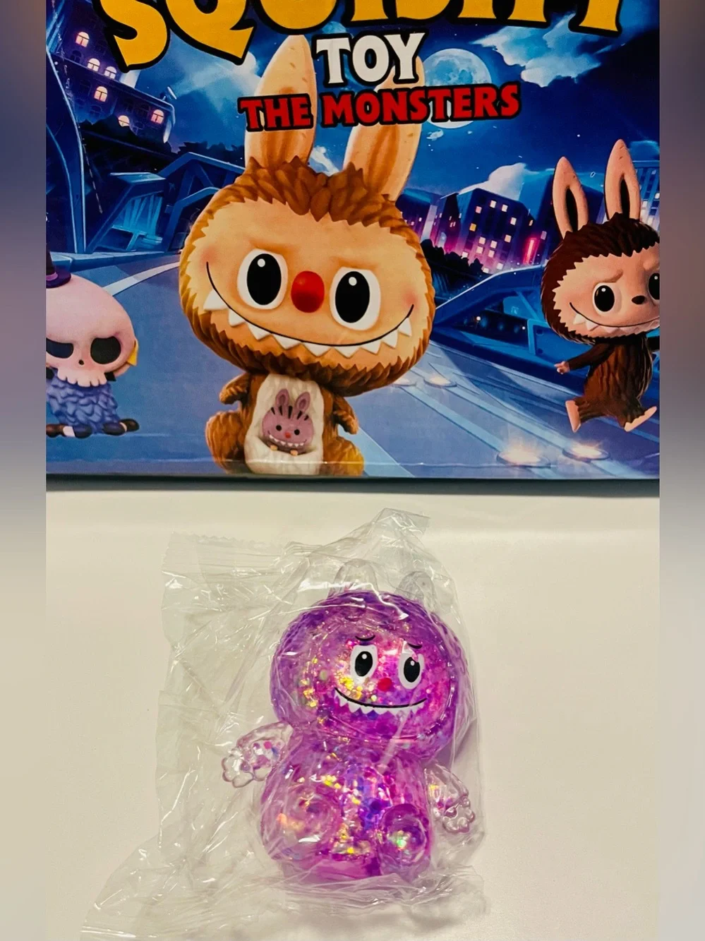 Purple Glitter Monster Squishy Toy
